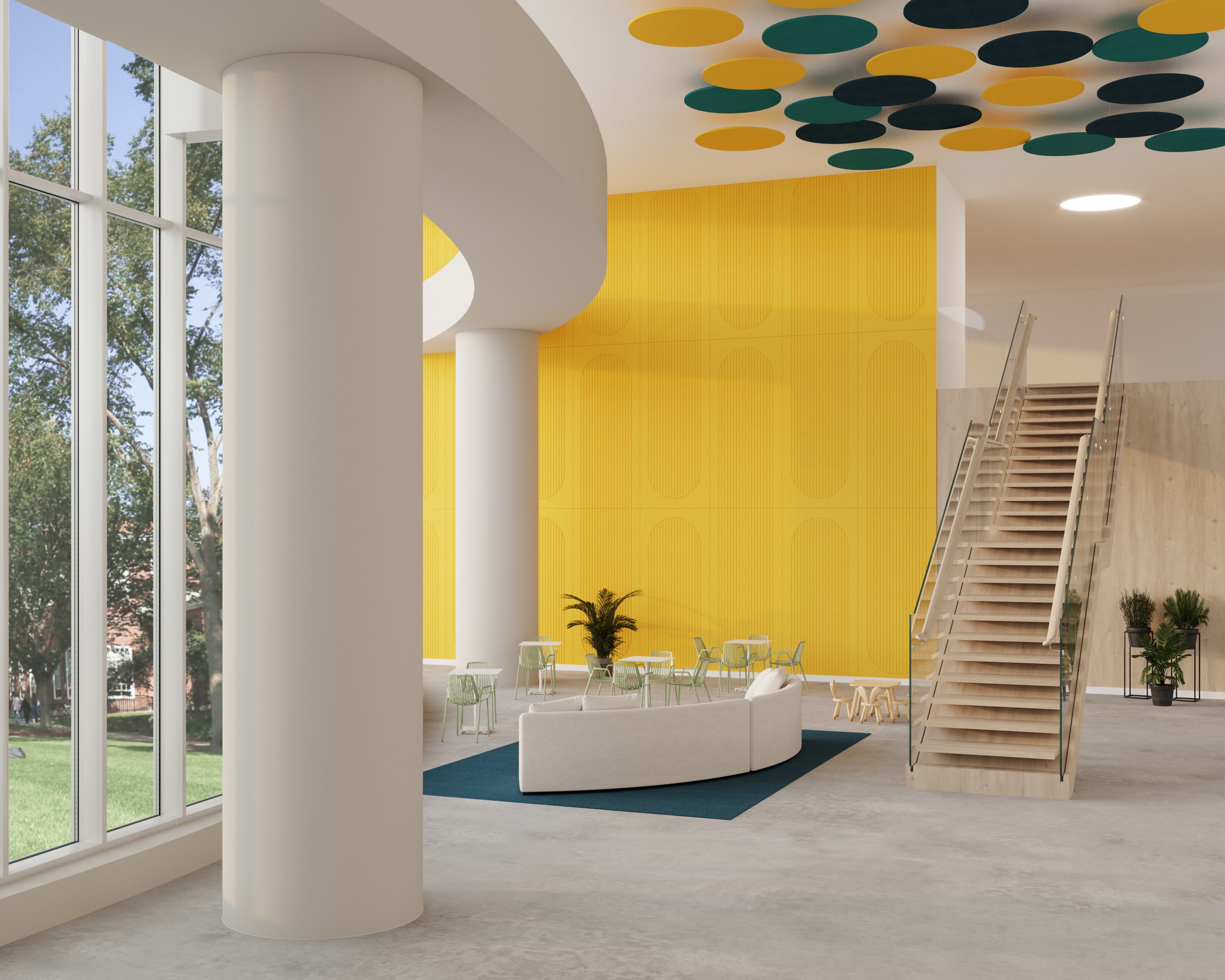 Bright, modern interior with large windows, yellow accent wall, and a staircase with glass railing. Circular yellow and green acoustic felt ceiling clouds hang from the ceiling. Seating area has white cushioned couches, green chairs, and small tables on a blue rug.