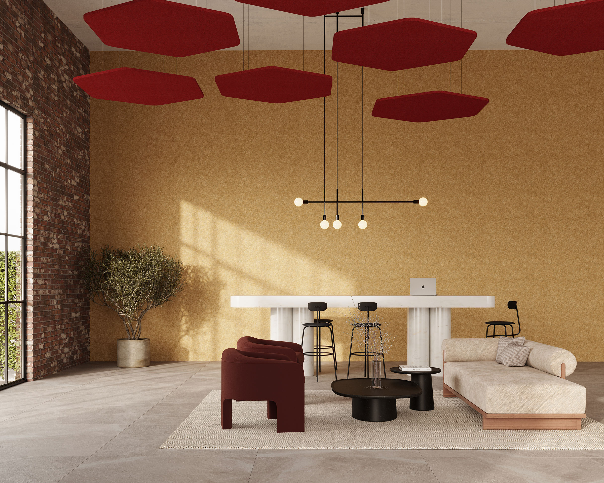 A modern, stylish living room with a minimalistic design features red hexagon acoustic felt ceiling clouds, a beige sofa, a red armchair, and round black coffee tables on a beige rug. A tall potted plant stands by a large window with a brick wall background.