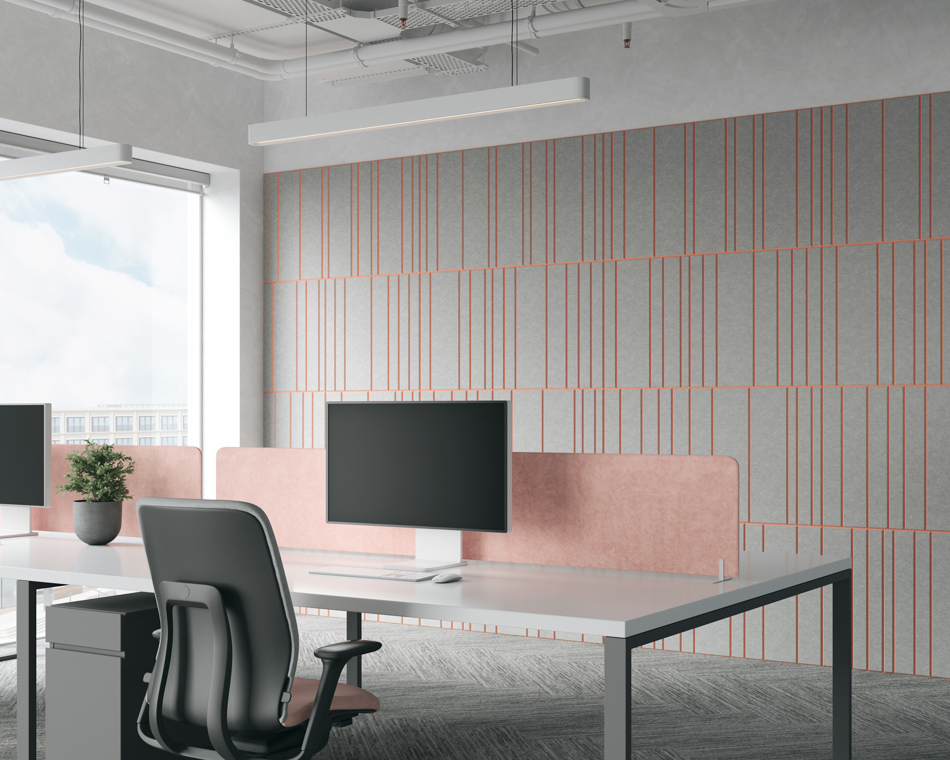 Modern office space with a minimalist design. It features a desk with a computer monitor and an ergonomic chair. The wall, adorned with geometric acoustic felt wall panels, enhances both style and sound quality. A light fixture hangs from the ceiling while large windows provide ample natural light.