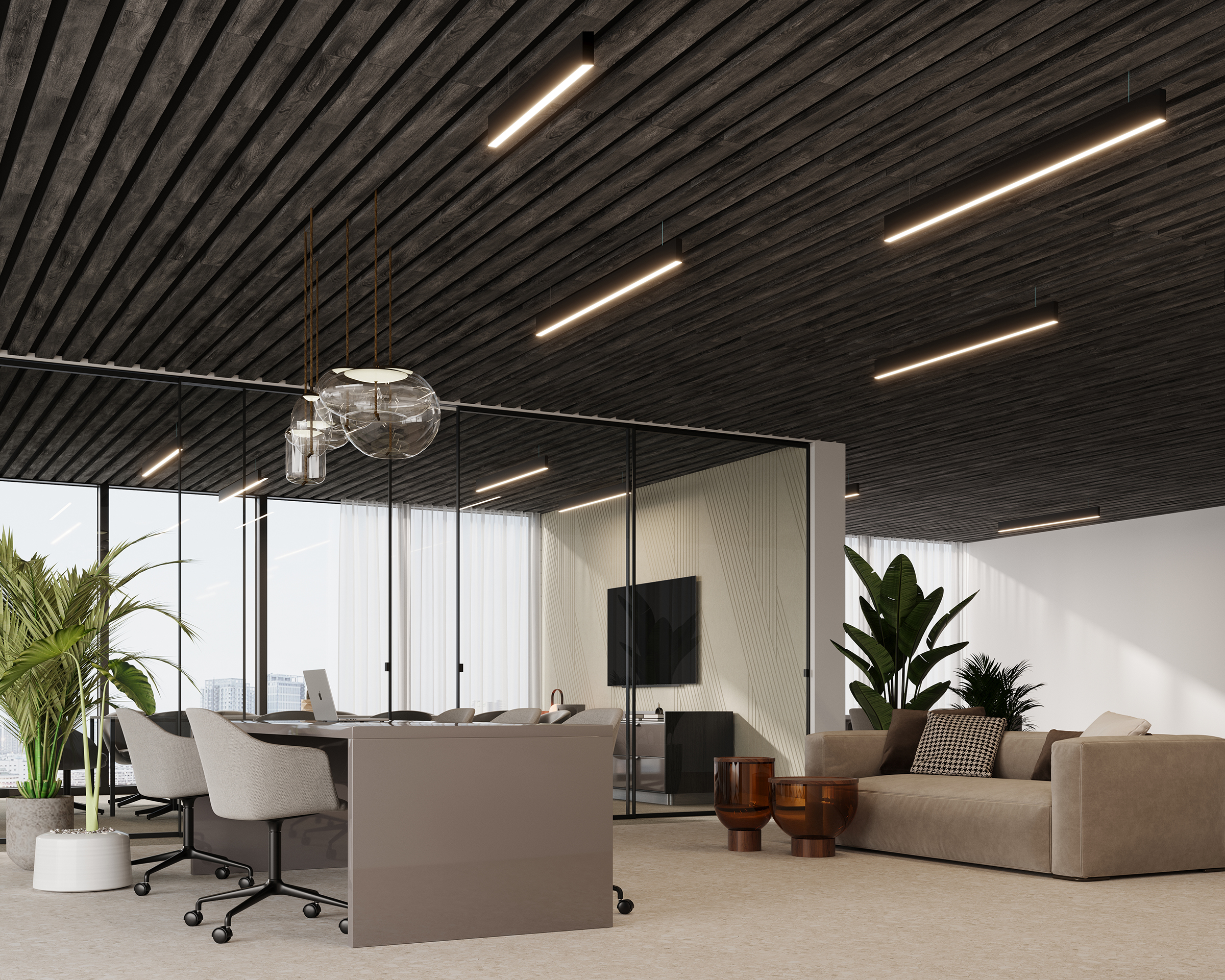 A modern office space featuring a sleek conference table with chairs, a sofa, potted plants, and a TV mounted on the wall. The room boasts large glass partitions, an acoustic felt ceiling frame with track lighting, and ample natural light from the windows.