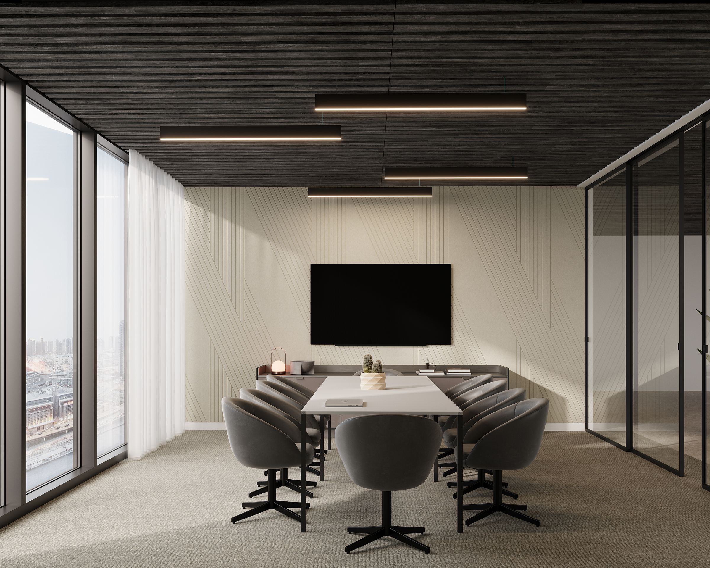 A modern conference room with a long white table surrounded by gray swivel chairs. The room features large floor-to-ceiling windows on one side, a wall-mounted flat-screen TV, and minimalist decor, including a cactus plant and small decorative items on a side cabinet. An acoustic felt ceiling frame enhances sound quality.