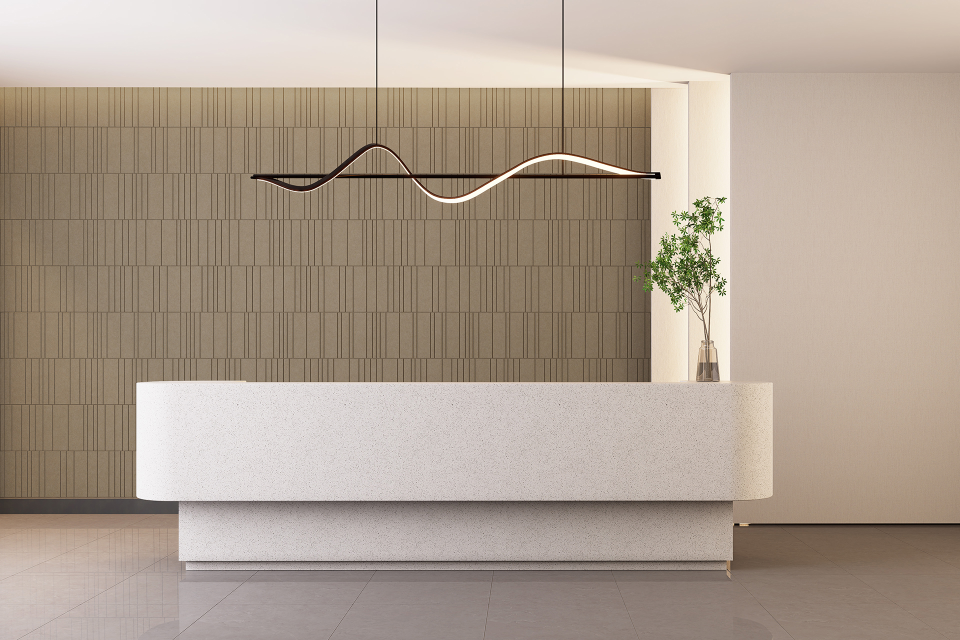 A minimalist reception area with a curved white desk, a green plant in a vase, and a modern wavy light fixture hanging above. The backdrop features a textured light brown acoustic felt wall and a smooth, light-colored floor.