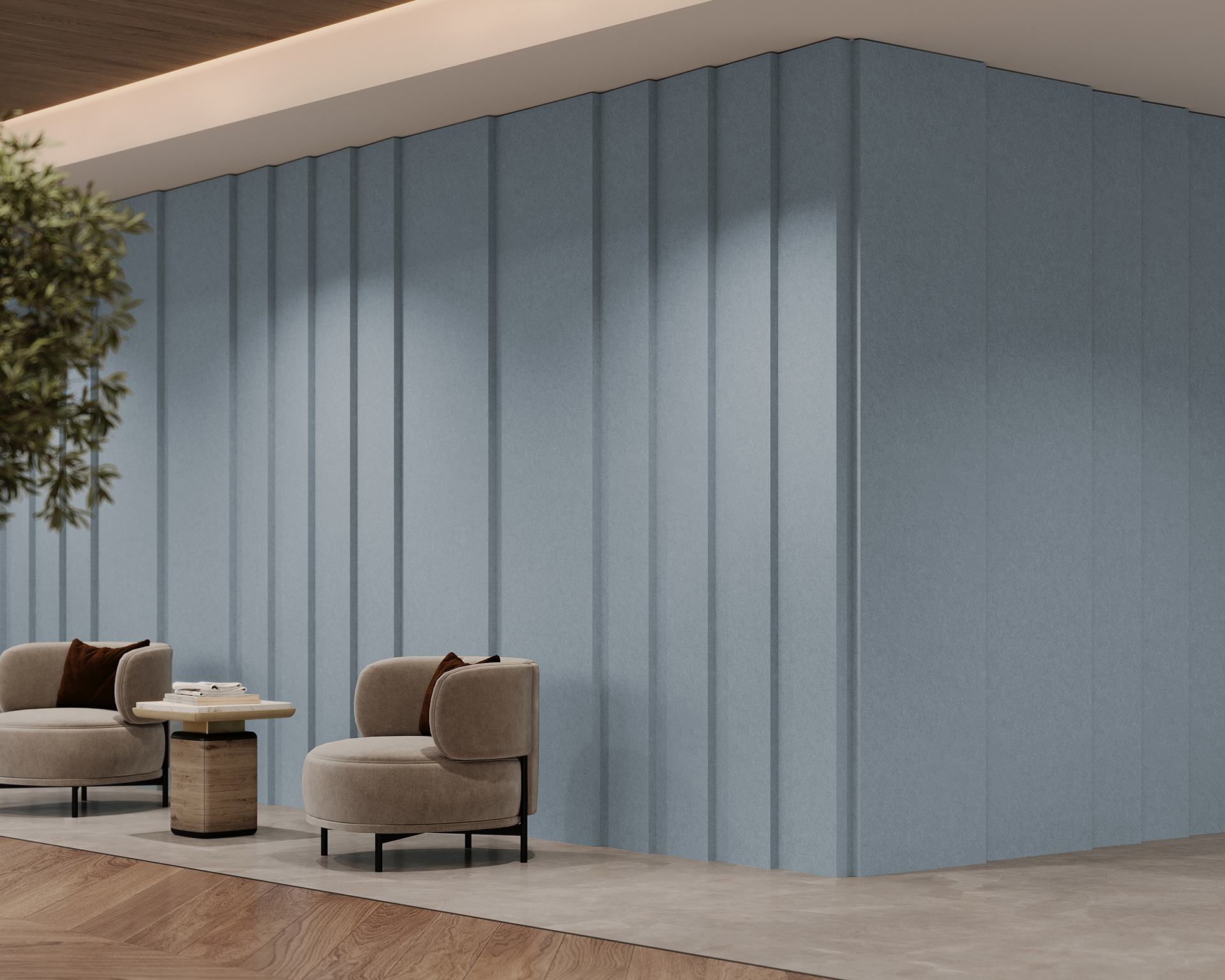 Modern interior with two beige armchairs and a wooden coffee table on a light wood floor. The wall features vertical acoustic felt paneling in a muted blue-gray tone, and a small tree adds a natural touch to the space.