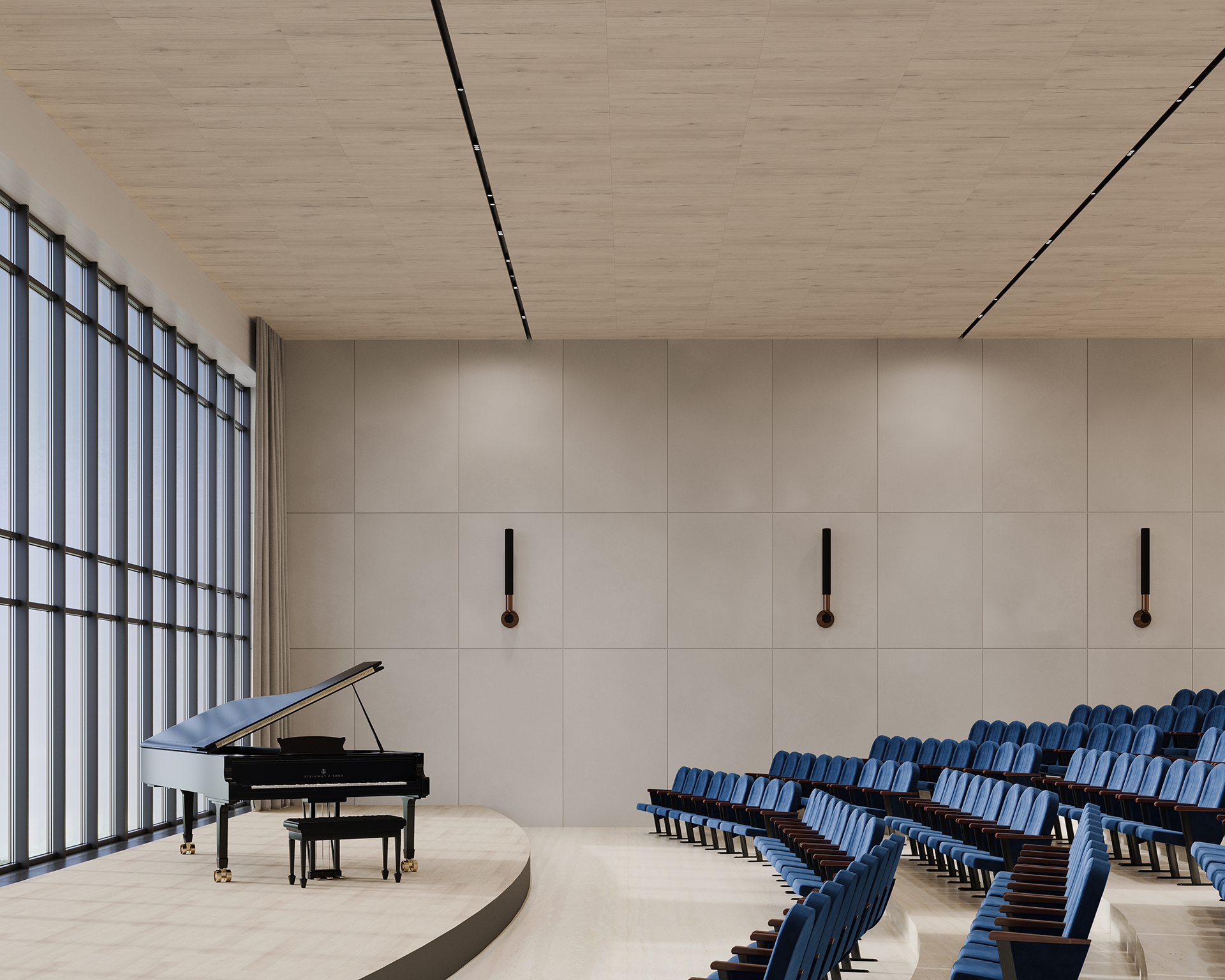 An empty auditorium with tiered rows of blue chairs faces a stage, where a grand piano sits gracefully. Large windows bathe the space in natural light, while modern wall sconces adorn the right wall and acoustic felt ceiling panels enhance sound quality.