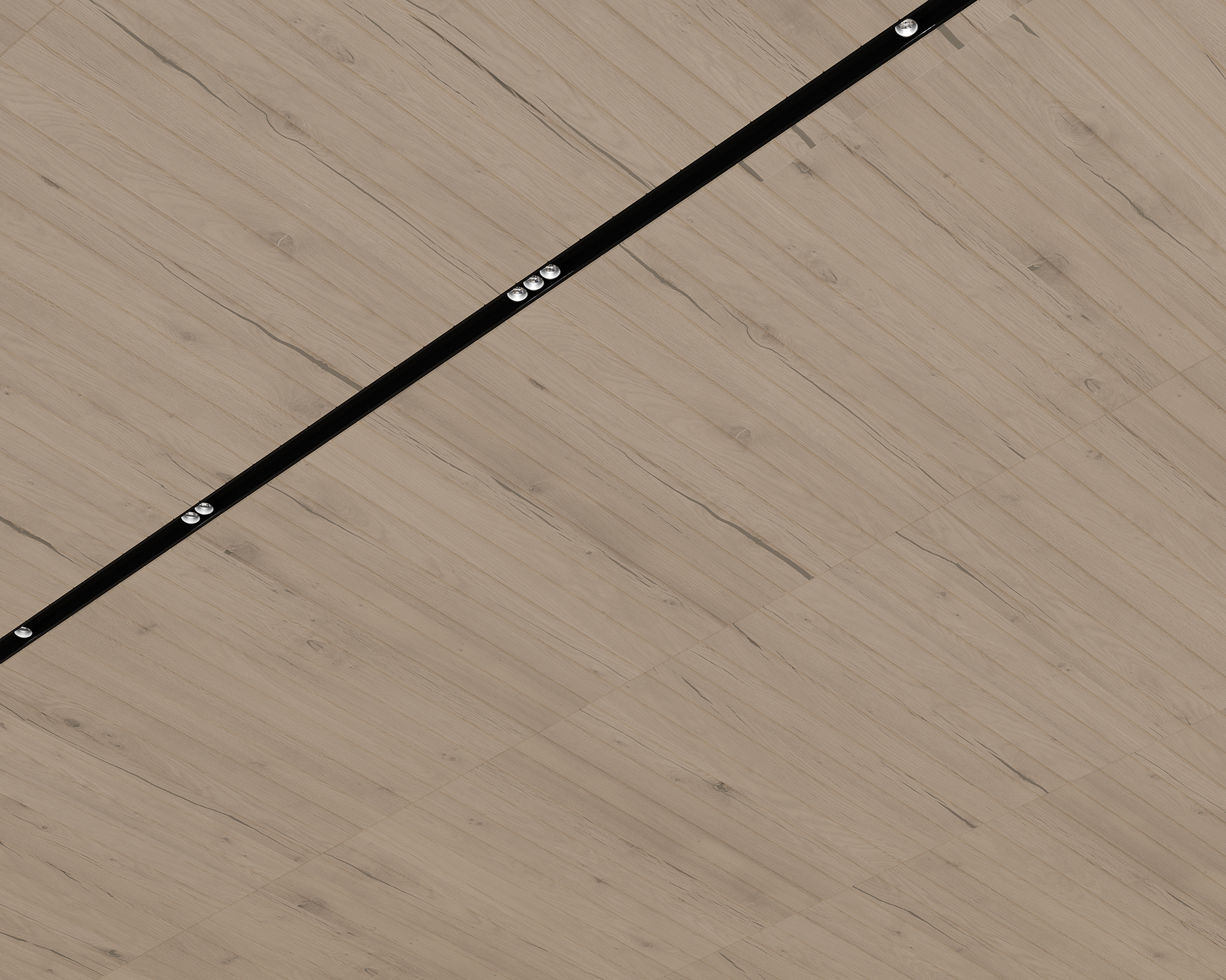 A light woodgrain acoustic felt ceiling with a diagonal black strip featuring small round lights. The woodgrain panels are arranged in a geometric pattern, while the strip adds a modern touch to the design, enhancing its acoustic qualities.