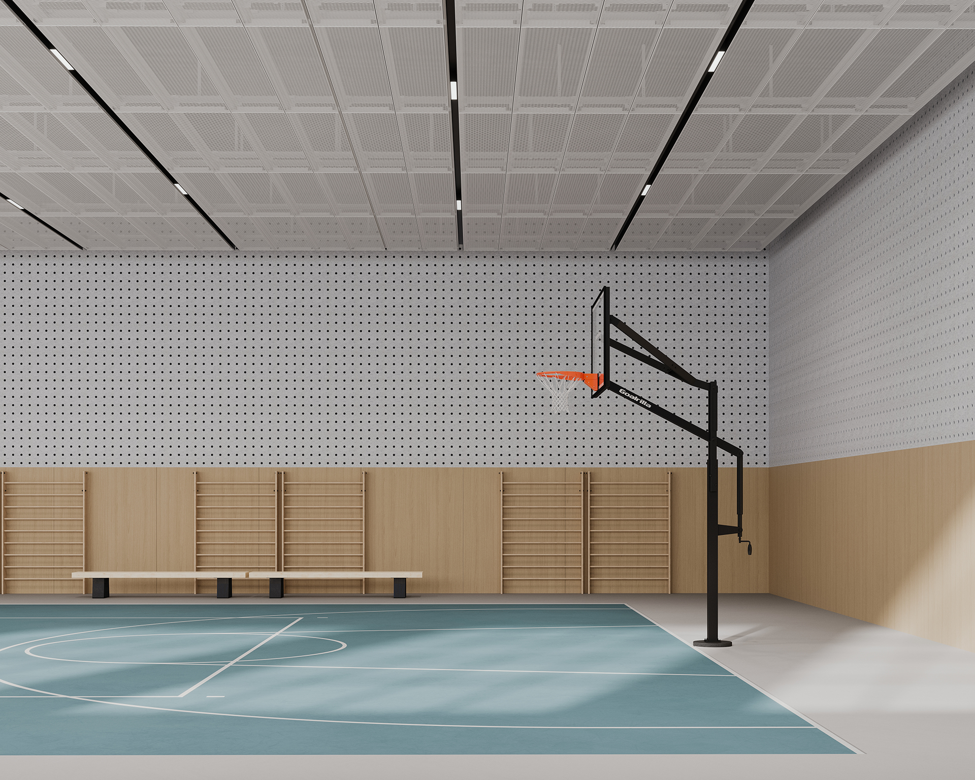 A modern indoor basketball court with a light blue playing surface. An adjustable basketball hoop stands on the right. The walls are paneled with circle acoustic felt perforated panels. A bench and wooden rack are against the wall.