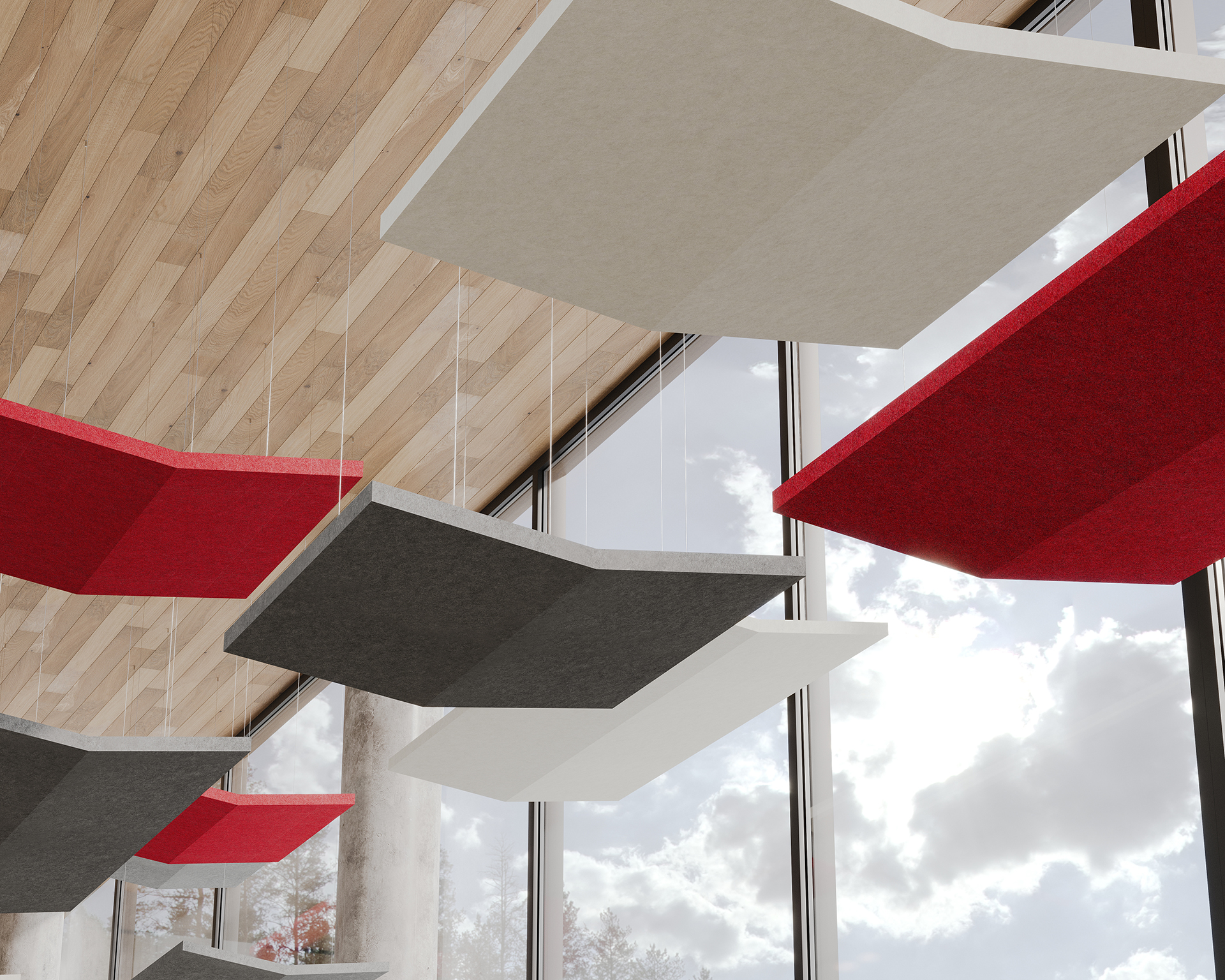 Modern ceiling design featuring large, suspended acoustic felt panels in red, gray, and white. Panels contrast with a wooden ceiling, while large windows offer a view of a cloudy sky, enhancing the room's open, contemporary ambiance.