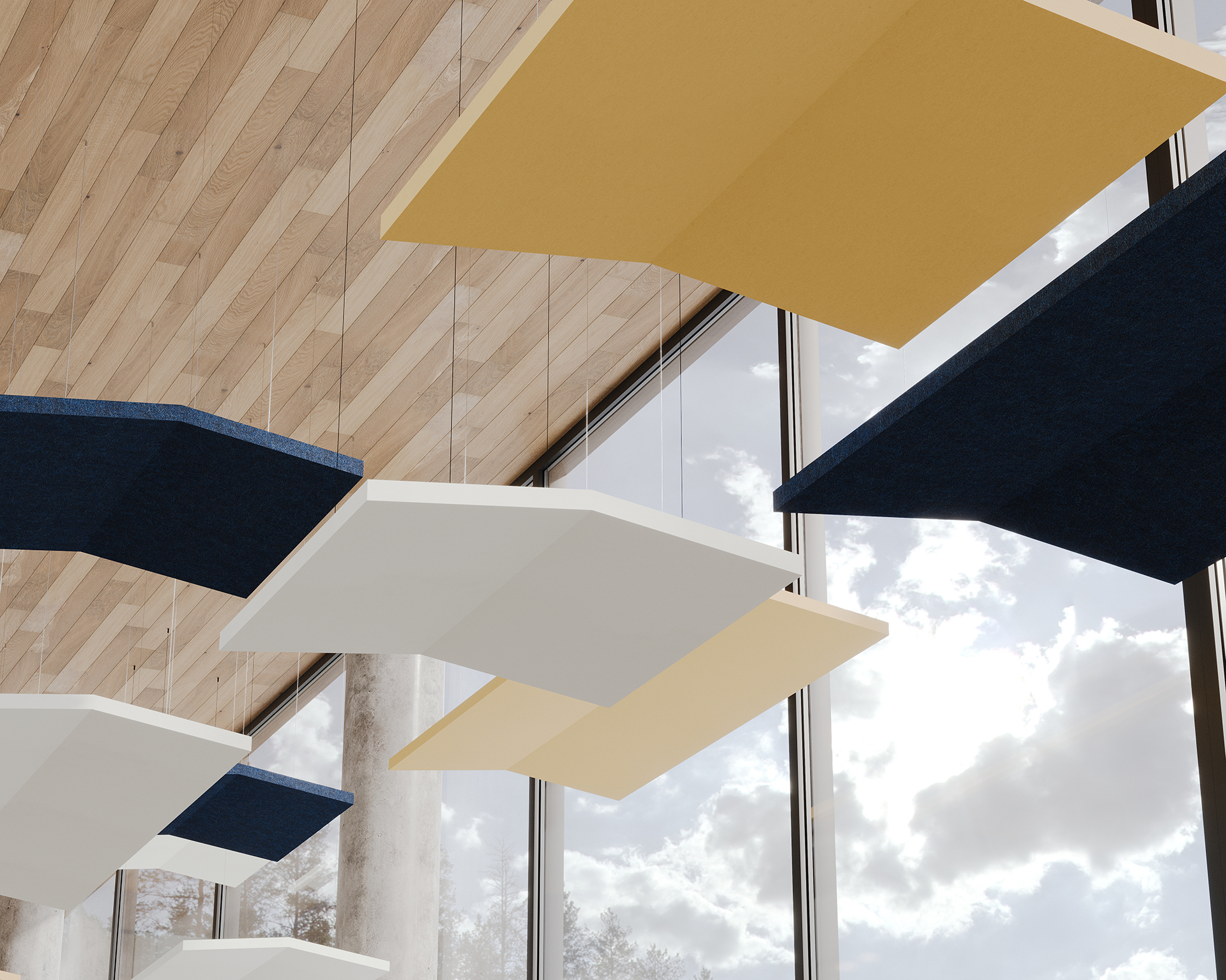 Geometric acoustic felt panels in blue, white, and yellow are suspended in a modern room with a wooden ceiling. Large windows show a view of a cloudy sky, blending natural and architectural elements.