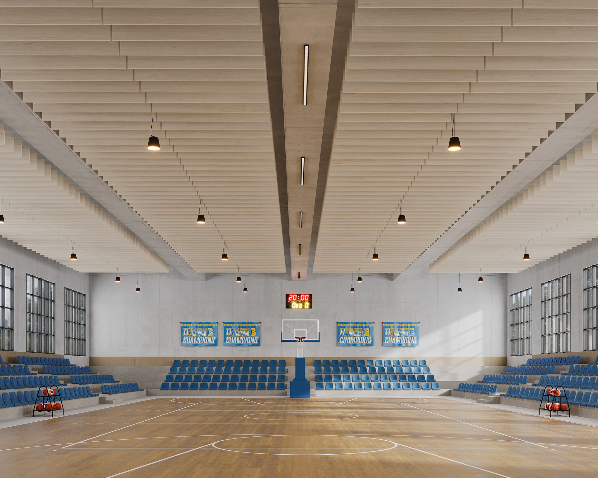 Interior of an empty indoor basketball court with wooden flooring. Blue seats line the sides and a basketball hoop is centered at the end. The scoreboard shows "20:00." Basketballs are on racks at each side of the court. Ceiling lights are on within a woodgrain baffled ceiling featuring acoustic felt.