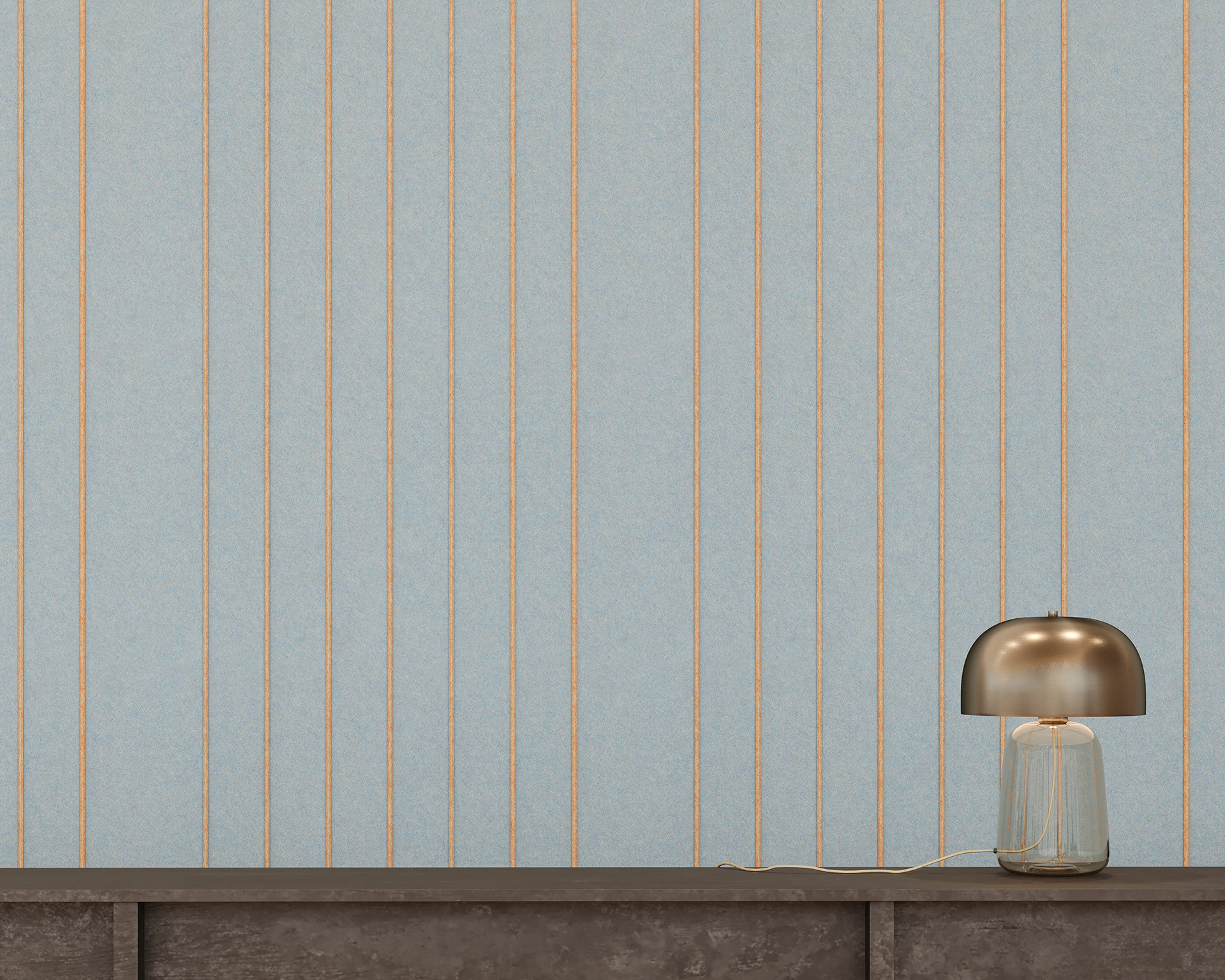 A modern table lamp with a gold dome-shaped shade sits on a concrete surface. A blue acoustic felt wall with vertical orange lines is in the background, creating a minimalist and contemporary atmosphere.