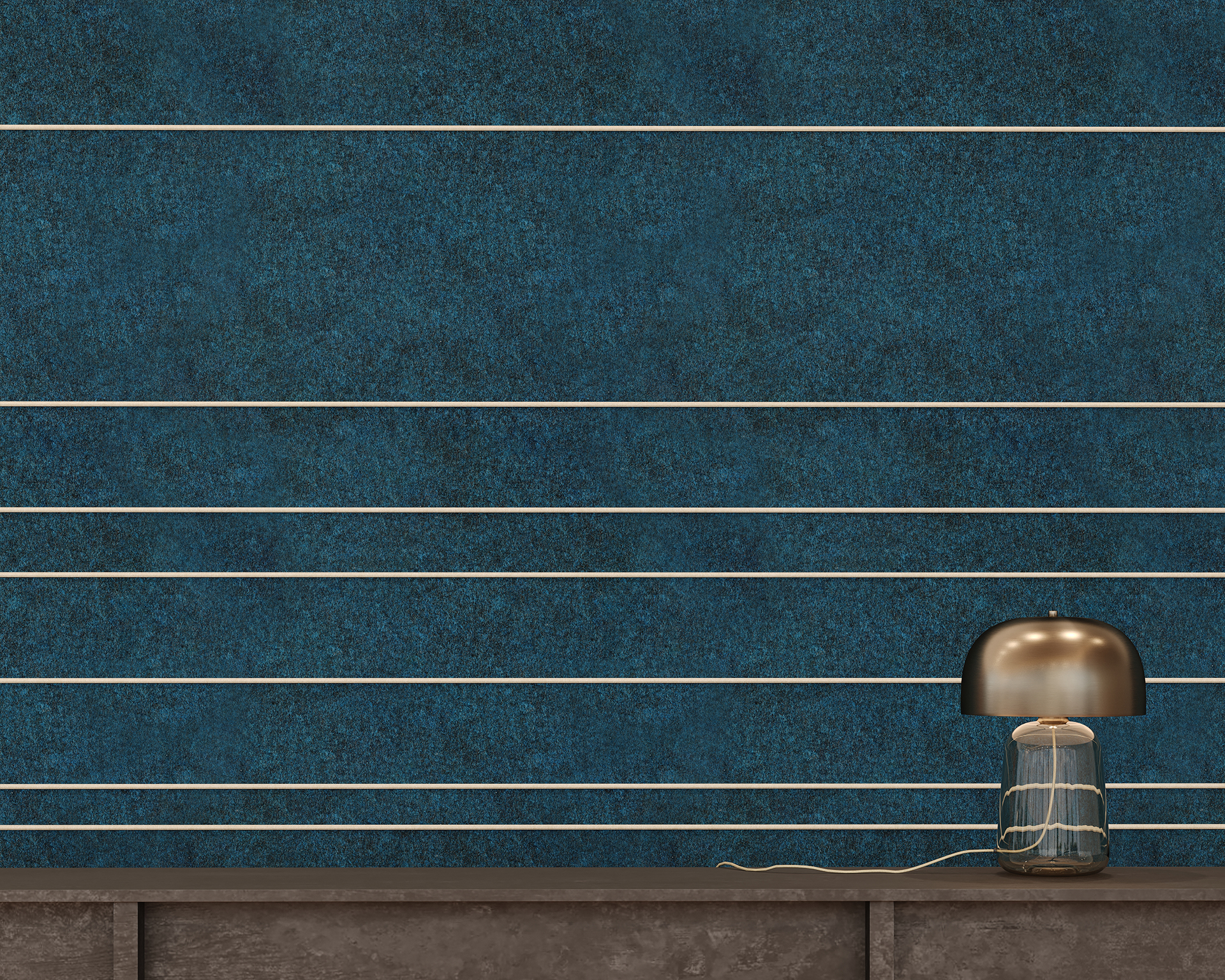 A textured blue acoustic felt wall with horizontal white lines behind a dark wooden table. On the table, there is a decorative lamp with a gold dome-shaped shade and a base featuring blue and gold designs.