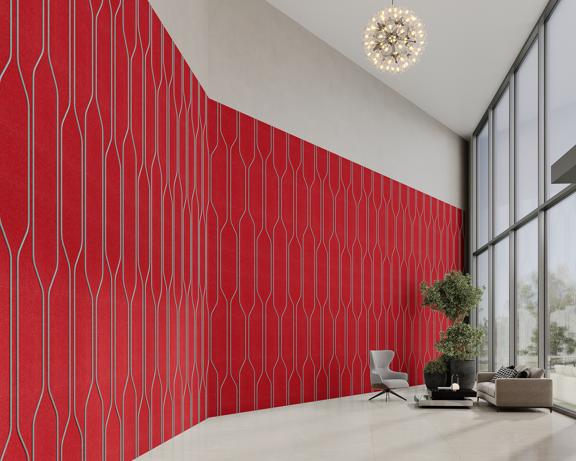 Modern interior with a striking red acoustic felt geometric patterned wall. There’s a cozy seating area with a gray chair and a couch by large floor-to-ceiling windows. A round chandelier hangs from the ceiling, adding elegance to the bright and spacious room.