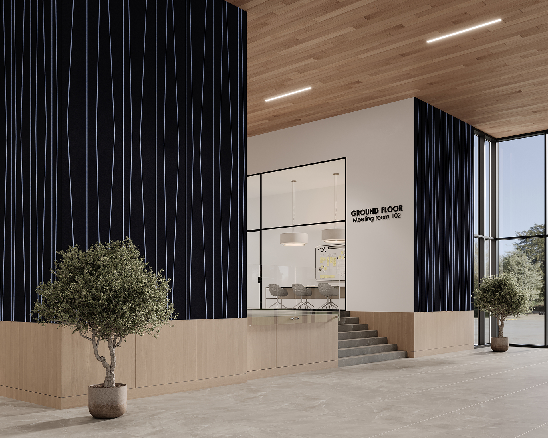 Modern office lobby with high ceilings, dark vertical-striped acoustic felt walls, and light wood accents. A small staircase leads to a meeting room with a glass window. Two potted trees decorate the space. Sign reads "Ground Floor, Meeting Room 102.