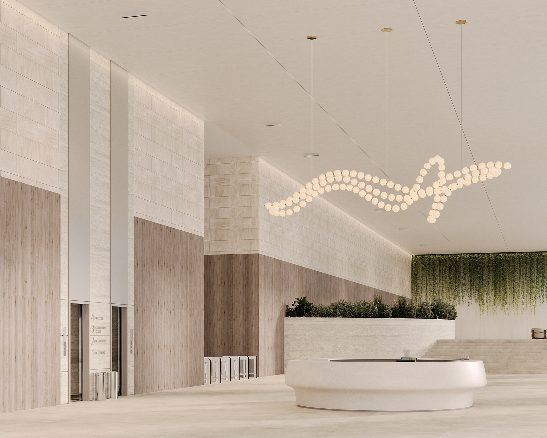 A spacious, modern lobby with a tall ceiling. It features a curvy, elegant chandelier made of many small lights. The decor includes green plants along one wall and a sleek, circular reception desk at the center. Neutral tones and acoustic felt walls dominate the space.