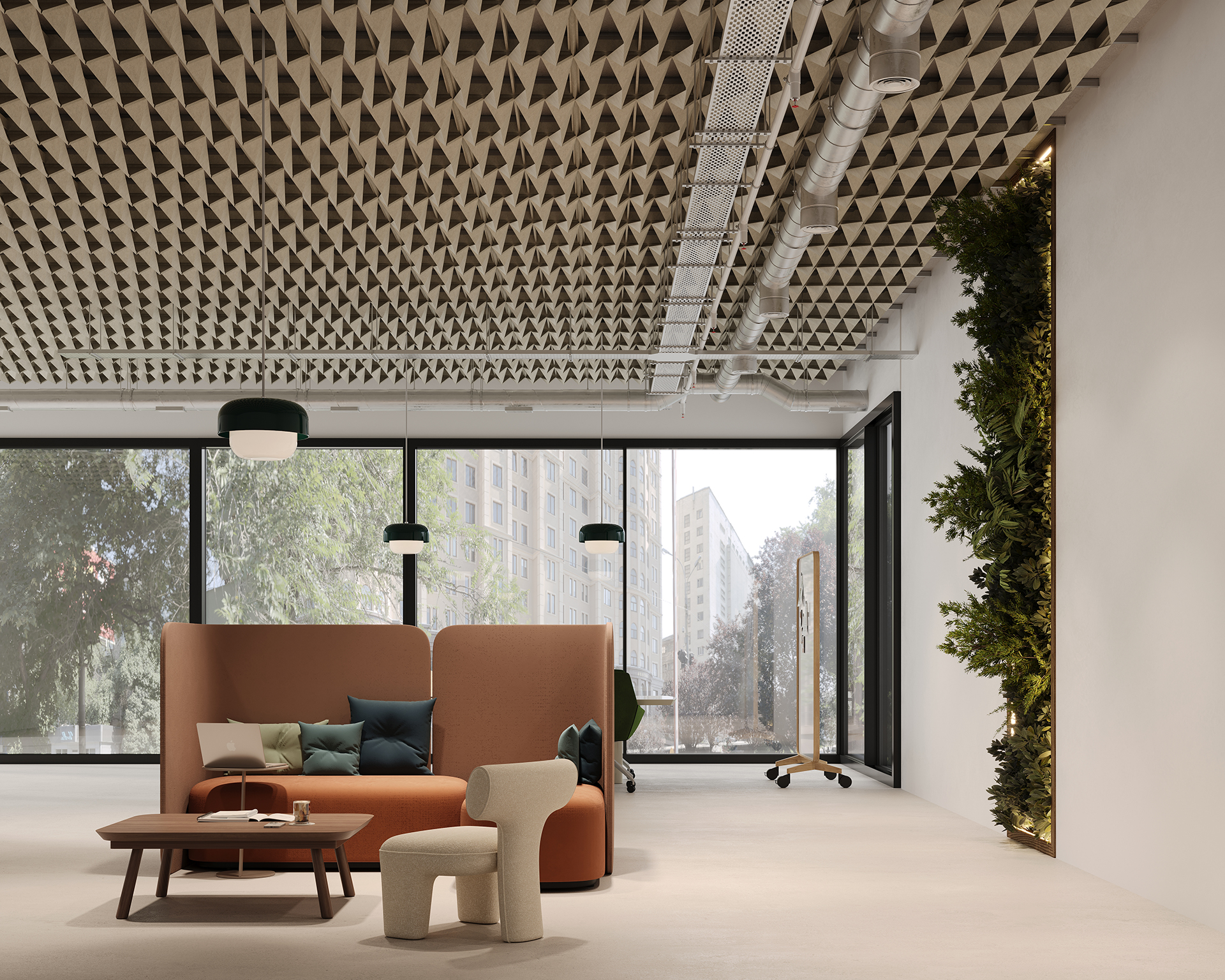 Modern office space with geometric acoustic felt ceiling design, large windows, and a vertical green wall. Features a cozy seating area with a brown sofa, green cushions, a small beige chair, and a wooden coffee table, creating a comfortable, stylish atmosphere.